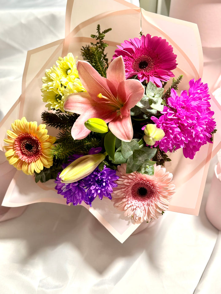 Basket with Sparkling Wine, Chocolates &amp; Flowers